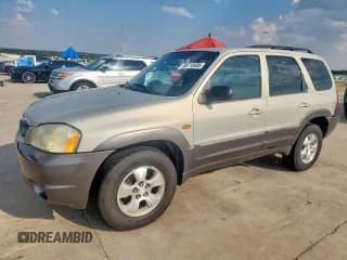 ✅ 2003 Mazda Tribute ES • VIN: 4F2CZ06183KM51365 • Лот: 80715485. Опубликован ранее на Copart с пробегом 337 275 миль. Бесплатный доступ к архиву аукционных продаж из США и подробный отчёт об истории автомобиля на DreamBid. Изображение 1.