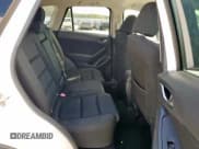 ✅ 2016 Mazda CX-5 Touring • VIN: JM3KE2CY2G0607428 • Лот: 91684385. Опубликован ранее на Copart с пробегом 130 111 миль. Бесплатный доступ к архиву аукционных продаж из США и подробный отчёт об истории автомобиля на DreamBid. Изображение 11.