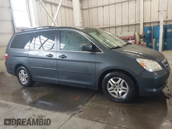 ✅ 2005 Honda Odyssey EX-L • VIN: 5FNRL38765B044868 • Lot: 43543067. Wystawiony na IAAI z przebiegiem 217 317 mil. Bezpłatny archiwum sprzedaży aukcyjnych z USA i szczegółowy raport historii pojazdu na DreamBid. Zdjęcie 13.