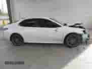 2023 Toyota Camry SE with VIN 4T1G11BK2PU099094, listed as a IAAI auction lot 41403372 with 57,261 mi miles and . Bid and sale history available at DreamBid. Image 13.