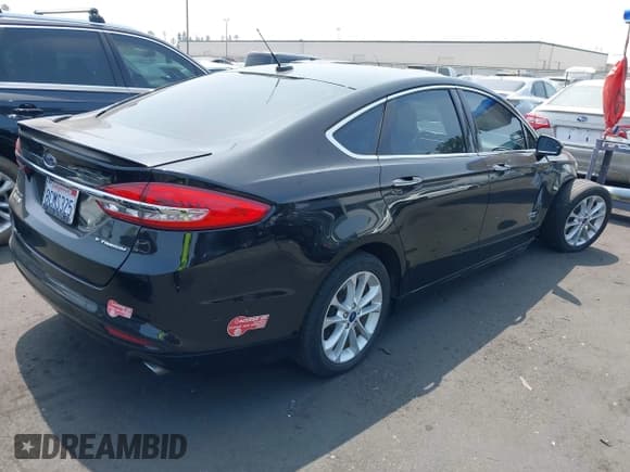 ✅ 2018 Ford Fusion Titanium • VIN: 3FA6P0SU3JR110585 • Lot: 42703340. Listed on IAAI with 113,723 mi. Free auction sales archive from the USA and detailed vehicle history report at DreamBid. Image 4.