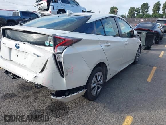 ✅ 2018 Toyota Prius Two • VIN: JTDKBRFU3J3590860 • Lot: 43486808. Listed on IAAI with 92,820 mi. Free auction sales archive from the USA and detailed vehicle history report at DreamBid. Image 4.