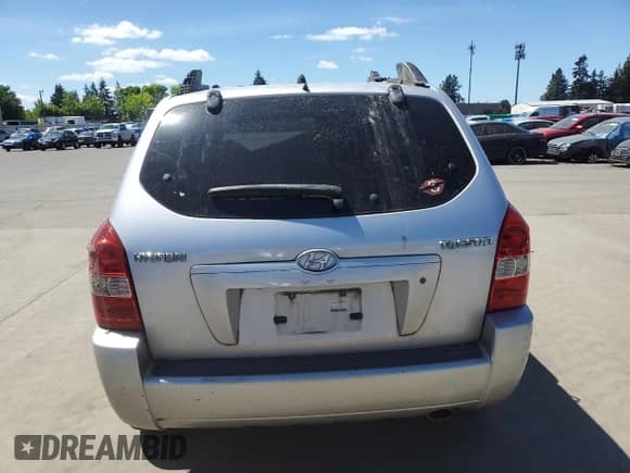 2005 Hyundai Tucson GL z VIN KM8JM12B25U076246, wystawiony jako Copart lot #54030704 z przebiegiem Nie podano mil oraz Szkoda całkowita • Salvage title. Historia ofert i sprzedaży dostępna na DreamBid. Obrazek 6.