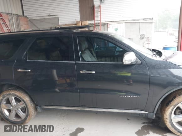 ✅ 2013 Dodge Durango Citadel • VIN: 1C4RDHEG6DC602163 • Lot: 42901766. Listed on IAAI with 136,731 mi. Free auction sales archive from the USA and detailed vehicle history report at DreamBid. Image 13.