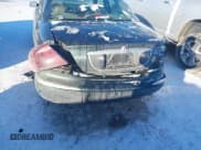 ✅ 1998 Lincoln Continental • VIN: 1LNFM97V4WY713283 • Lot: 41264918. Listed on IAAI with 89,134 mi. Free auction sales archive from the USA and detailed vehicle history report at DreamBid. Image 6.