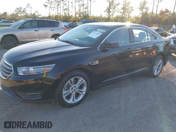 ✅ 2018 Ford Taurus SEL • VIN: 1FAHP2E83JG101458 • Lot: 43715095. Listed on IAAI with 216,688 mi. Free auction sales archive from the USA and detailed vehicle history report at DreamBid. Image 2.