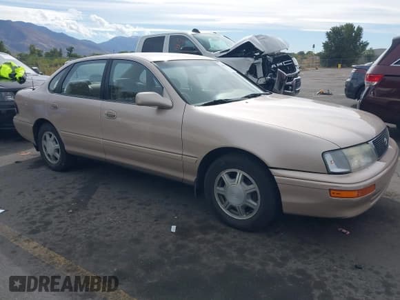✅ 1996 Toyota Avalon XL • VIN: 4T1BF12B5TU081498 • Lot: 43447174. Listed on IAAI with 189,829 mi. Free auction sales archive from the USA and detailed vehicle history report at DreamBid. Image 1.
