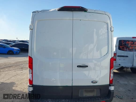 ✅ 2020 Ford Transit Cargo • VIN: 1FTBR1C84LKA16331 • Lot: 43753646. Listed on IAAI with 108,111 mi. Free auction sales archive from the USA and detailed vehicle history report at DreamBid. Image 16.