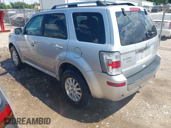 ✅ 2010 Mercury Mariner Premier • VIN: 4M2CN8H72AKJ00244 • Lot: 42502315. Listed on IAAI with 134,214 mi. Free auction sales archive from the USA and detailed vehicle history report at DreamBid. Image 3.