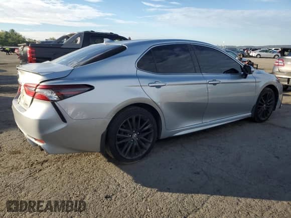 2022 Toyota Camry XSE with VIN 4T1K61AK5NU013156, listed as a Copart auction lot 85874215 with 100,320 mi miles and Salvage title. Bid and sale history available at DreamBid. Image 3.