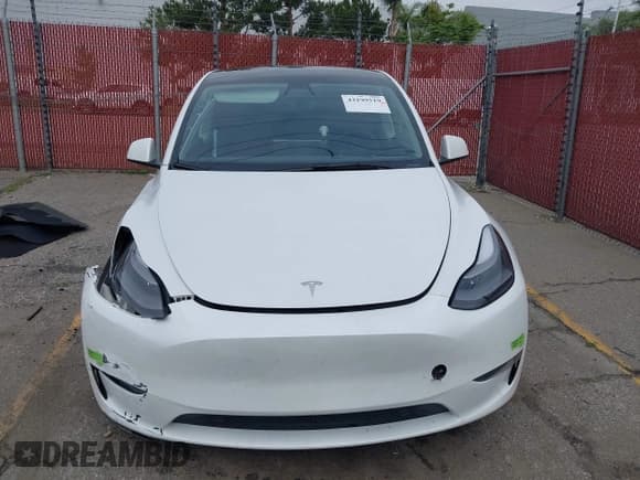 ✅ 2023 Tesla Model Y Long Range • VIN: 7SAYGAEE9PF702910 • Lot: 42199519. Wystawiony na IAAI z przebiegiem 91 094 mil. Bezpłatny archiwum sprzedaży aukcyjnych z USA i szczegółowy raport historii pojazdu na DreamBid. Zdjęcie 12.