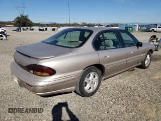✅ 1999 Pontiac Bonneville SE • VIN: 1G2HX52K4XH247855 • Lot: 72559044. Wystawiony na Copart z przebiegiem 160 677 mil. Bezpłatny archiwum sprzedaży aukcyjnych z USA i szczegółowy raport historii pojazdu na DreamBid. Zdjęcie 3.