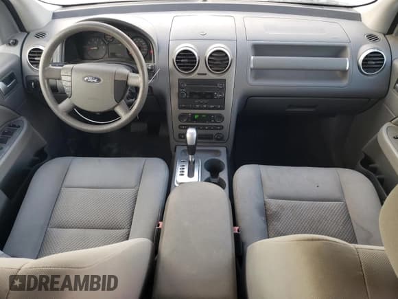 ✅ 2005 Ford Freestyle SE • VIN: 1FMZK01125GA49459 • Lot: 76355084. Wystawiony na Copart z przebiegiem 131 733 mil. Bezpłatny archiwum sprzedaży aukcyjnych z USA i szczegółowy raport historii pojazdu na DreamBid. Zdjęcie 8.