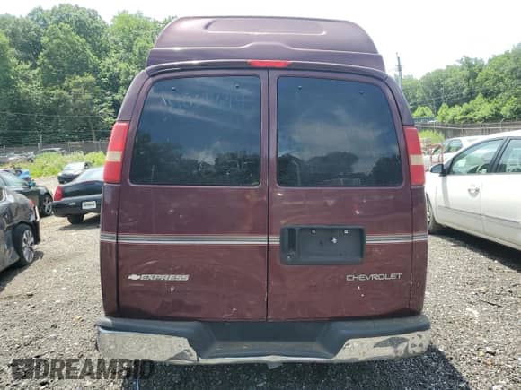 2003 Chevrolet Express Passenger with VIN 1GBFG15X431233061, listed as a Copart auction lot 62646375 with Not provided miles and Salvage title. Bid and sale history available at DreamBid. Image 6.