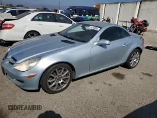 ✅ 2005 Mercedes-Benz SLK 230/320 • VIN: WDBWK56F75F059871 • Лот: 74153334. Опубликован ранее на Copart с пробегом 128 999 миль. Бесплатный доступ к архиву аукционных продаж из США и подробный отчёт об истории автомобиля на DreamBid. Изображение 1.