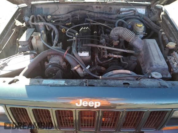 ✅ 2000 Jeep Cherokee • VIN: 1J4FF48S2YL273077 • Lot: 89565855. Listed on Copart with 272,270 mi. Free auction sales archive from the USA and detailed vehicle history report at DreamBid. Image 12.