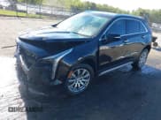 ✅ 2021 Cadillac XT4 FWD Premium Luxury • VIN: 1GYFZCR43MF052422 • Лот: 41985859. Опубликован ранее на IAAI с пробегом 25 112 миль. Бесплатный доступ к архиву аукционных продаж из США и подробный отчёт об истории автомобиля на DreamBid. Изображение 19.