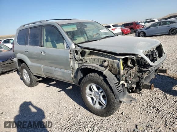 ✅ 2003 Lexus GX 470 • VIN: JTJBT20X130004567 • Лот: 70737524. Опубликован ранее на Copart с пробегом 237 001 миль. Бесплатный доступ к архиву аукционных продаж из США и подробный отчёт об истории автомобиля на DreamBid. Изображение 4.