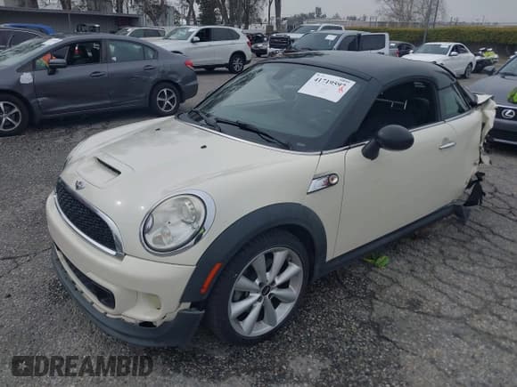 ✅ 2013 MINI Coupe S • VIN: WMWSX3C53DT466648 • Lot: 41719597. Listed on IAAI with 106,936 mi. Free auction sales archive from the USA and detailed vehicle history report at DreamBid. Image 2.