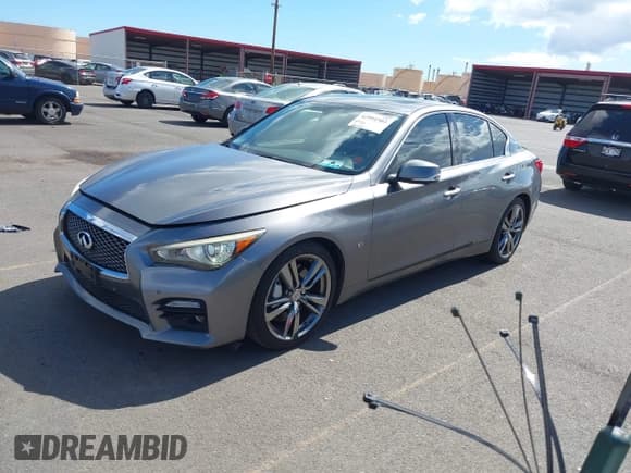 ✅ 2014 Infiniti Q50 Premium • VIN: JN1BV7AP4EM684004 • Lot: 42991503. Listed on IAAI with 166,575 mi. Free auction sales archive from the USA and detailed vehicle history report at DreamBid. Image 2.