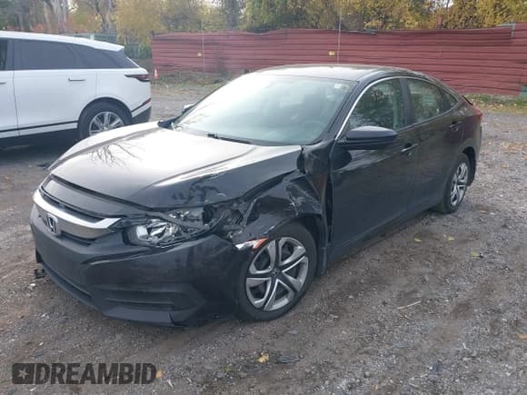 ✅ 2017 Honda Civic LX • VIN: 19XFC2F50HE074795 • Lot: 43630613. Listed on IAAI with 64,607 mi. Free auction sales archive from the USA and detailed vehicle history report at DreamBid. Image 17.