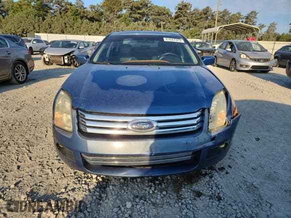 ✅ 2009 Ford Fusion SE • VIN: 3FAHP07ZX9R162370 • Lot: 81647375. Wystawiony na Copart z przebiegiem 216 046 mil. Bezpłatny archiwum sprzedaży aukcyjnych z USA i szczegółowy raport historii pojazdu na DreamBid. Zdjęcie 5.