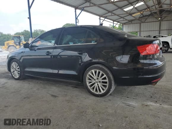 ✅ 2012 Volkswagen Jetta SEL • VIN: 3VWLX7AJ2CM409477 • Lot: 59476915. Listed on Copart with 156,035 mi. Free auction sales archive from the USA and detailed vehicle history report at DreamBid. Image 2.