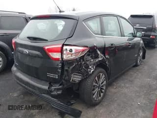 ✅ 2018 Ford C-Max Titanium • VIN: 1FADP5DU2JL104535 • Lot: 43709653. Listed on IAAI with 102,432 mi. Free auction sales archive from the USA and detailed vehicle history report at DreamBid. Image 4.