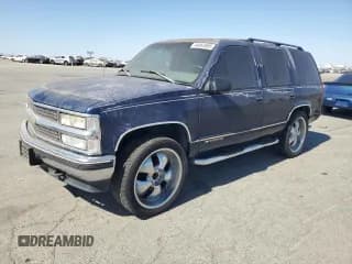 ✅ 1998 Chevrolet Tahoe • VIN: 1GNEK13RXWJ335793 • Лот: 64062605. Опубликован ранее на Copart с пробегом 129 766 миль. Бесплатный доступ к архиву аукционных продаж из США и подробный отчёт об истории автомобиля на DreamBid. Изображение 1.