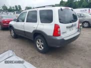 ✅ 2005 Mazda Tribute i • VIN: 4F2YZ92Z75KM42150 • Lot: 42703391. Listed on IAAI with 187,595 mi. Free auction sales archive from the USA and detailed vehicle history report at DreamBid. Image 3.