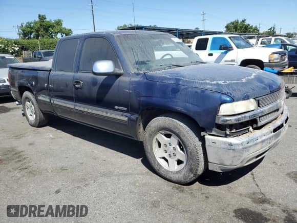 2001 Chevrolet Silverado 1500 LT with VIN 1GCEC19TX1Z139565, listed as a Copart auction lot 61339244 with 285,157 mi miles and Salvage title. Bid and sale history available at DreamBid. Image 4.