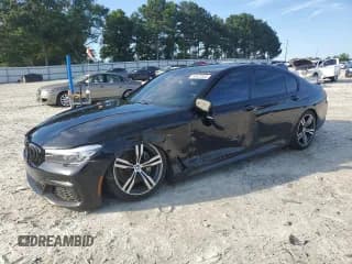 ✅ 2018 BMW 7 Series 740i • VIN: WBA7E2C55JB214956 • Lot: 63423525. Wystawiony na Copart z przebiegiem 88 274 mil. Bezpłatny archiwum sprzedaży aukcyjnych z USA i szczegółowy raport historii pojazdu na DreamBid. Zdjęcie 1.