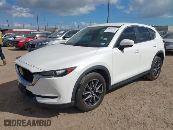 ✅ 2018 Mazda CX-5 Touring • VIN: JM3KFACM6J1409067 • Лот: 43716812. Опубликован ранее на IAAI с пробегом 76 489 миль. Бесплатный доступ к архиву аукционных продаж из США и подробный отчёт об истории автомобиля на DreamBid. Изображение 17.