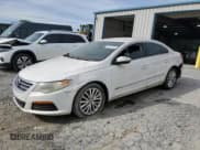 ✅ 2011 Volkswagen CC Sport • VIN: WVWMP7AN5BE728631 • Lot: 82147375. Listed on Copart with 142,336 mi. Free auction sales archive from the USA and detailed vehicle history report at DreamBid. Image 1.