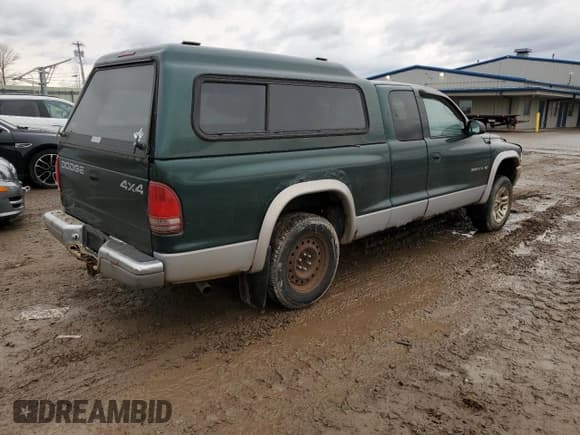 ✅ 1999 Dodge Dakota SLT • VIN: 1B7GG22X4XS309050 • Lot: 82030864. Wystawiony na Copart z przebiegiem 141 396 mil. Bezpłatny archiwum sprzedaży aukcyjnych z USA i szczegółowy raport historii pojazdu na DreamBid. Zdjęcie 3.