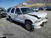 2004 Chevrolet Blazer LS with VIN 1GNDT13X34K148457, listed as a Copart auction lot 78950174 with 79,191 mi miles and Salvage title. Bid and sale history available at DreamBid. Image 4.