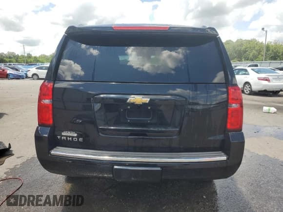 ✅ 2015 Chevrolet Tahoe LTZ • VIN: 1GNSCCKC3FR633581 • Lot: 65729215. Listed on Copart with 135,551 mi. Free auction sales archive from the USA and detailed vehicle history report at DreamBid. Image 6.