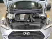 2014 Hyundai Veloster Turbo z VIN KMHTC6AE2EU208474, wystawiony jako Copart lot #65442584 z przebiegiem 57 596 mil mil oraz Szkoda całkowita • Salvage title. Historia ofert i sprzedaży dostępna na DreamBid. Obrazek 11.