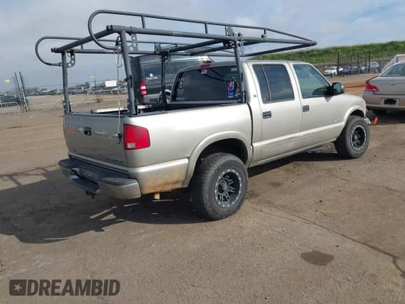 ✅ 2003 Chevrolet S-10 LS • VIN: 1GCDT13X73K125495 • Лот: 41648502. Опубликован ранее на IAAI с пробегом 180 684 миль. Бесплатный доступ к архиву аукционных продаж из США и подробный отчёт об истории автомобиля на DreamBid. Изображение 4.