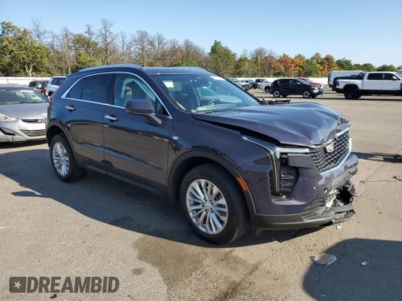 ✅ 2024 Cadillac XT4 AWD Luxury • VIN: 1GYFZBR42RF202649 • Lot: 71652865. Listed on Copart with 12,667 mi. Free auction sales archive from the USA and detailed vehicle history report at DreamBid. Image 4.
