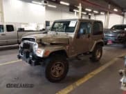 ✅ 2004 Jeep Wrangler Sahara • VIN: 1J4FA59S04P747727 • Lot: 43599384. Listed on IAAI with 190,912 mi. Free auction sales archive from the USA and detailed vehicle history report at DreamBid. Image 2.