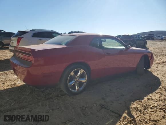 ✅ 2013 Dodge Challenger SXT Plus • VIN: 2C3CDYAG7DH570272 • Lot: 76894524. Wystawiony na Copart z przebiegiem 131 827 mil. Bezpłatny archiwum sprzedaży aukcyjnych z USA i szczegółowy raport historii pojazdu na DreamBid. Zdjęcie 3.