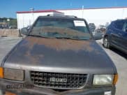 ✅ 1996 Isuzu Rodeo • VIN: 4S2CK58V5T4310439 • Лот: 43089493. Опубликован ранее на IAAI с пробегом 126 998 миль. Бесплатный доступ к архиву аукционных продаж из США и подробный отчёт об истории автомобиля на DreamBid. Изображение 6.