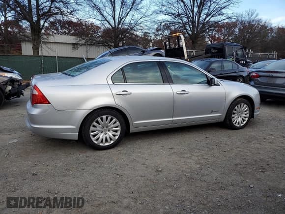 ✅ 2012 Ford Fusion Hybrid • VIN: 3FADP0L30CR243515 • Lot: 92265305. Listed on Copart with 62,142 mi. Free auction sales archive from the USA and detailed vehicle history report at DreamBid. Image 3.