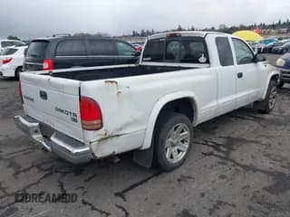 ✅ 2003 Dodge Dakota SLT • VIN: 1D7HL42N83S296040 • Lot: 41462371. Wystawiony na IAAI z przebiegiem 250 407 mil. Bezpłatny archiwum sprzedaży aukcyjnych z USA i szczegółowy raport historii pojazdu na DreamBid. Zdjęcie 4.
