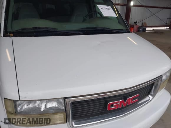 ✅ 2003 GMC Safari • VIN: 1GKDM19X13B501035 • Lot: 43775185. Listed on IAAI with 135,778 mi. Free auction sales archive from the USA and detailed vehicle history report at DreamBid. Image 6.