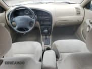 ✅ 2003 Kia Spectra • VIN: KNAFB121735291116 • Lot: 66861134. Listed on Copart with 167,222 mi. Free auction sales archive from the USA and detailed vehicle history report at DreamBid. Image 8.