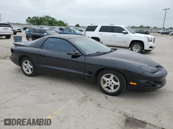 ✅ 1999 Pontiac Firebird Firebird • VIN: 2G2FS22K0X2226888 • Lot: 51380795. Listed on Copart with 137,800 mi. Free auction sales archive from the USA and detailed vehicle history report at DreamBid. Image 4.