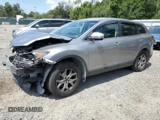 ✅ 2015 Mazda CX-9 Touring • VIN: JM3TB2CA4F0463086 • Lot: 90977675. Listed on Copart with 135,270 mi. Free auction sales archive from the USA and detailed vehicle history report at DreamBid. Image 1.