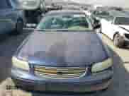 2001 Chevrolet Malibu LS z VIN 1G1NE52J616121147, wystawiony jako Copart lot #74778684 z przebiegiem 186 946 mil mil oraz Szkoda całkowita • Salvage title. Historia ofert i sprzedaży dostępna na DreamBid. Obrazek 5.